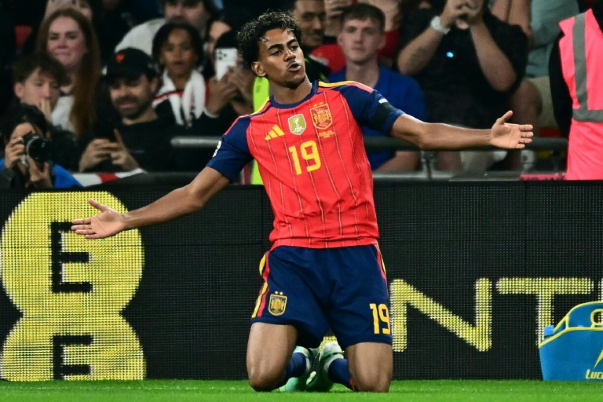 Spain forward Lamine Yamal celebrates his team's opening goal against England at Wembley