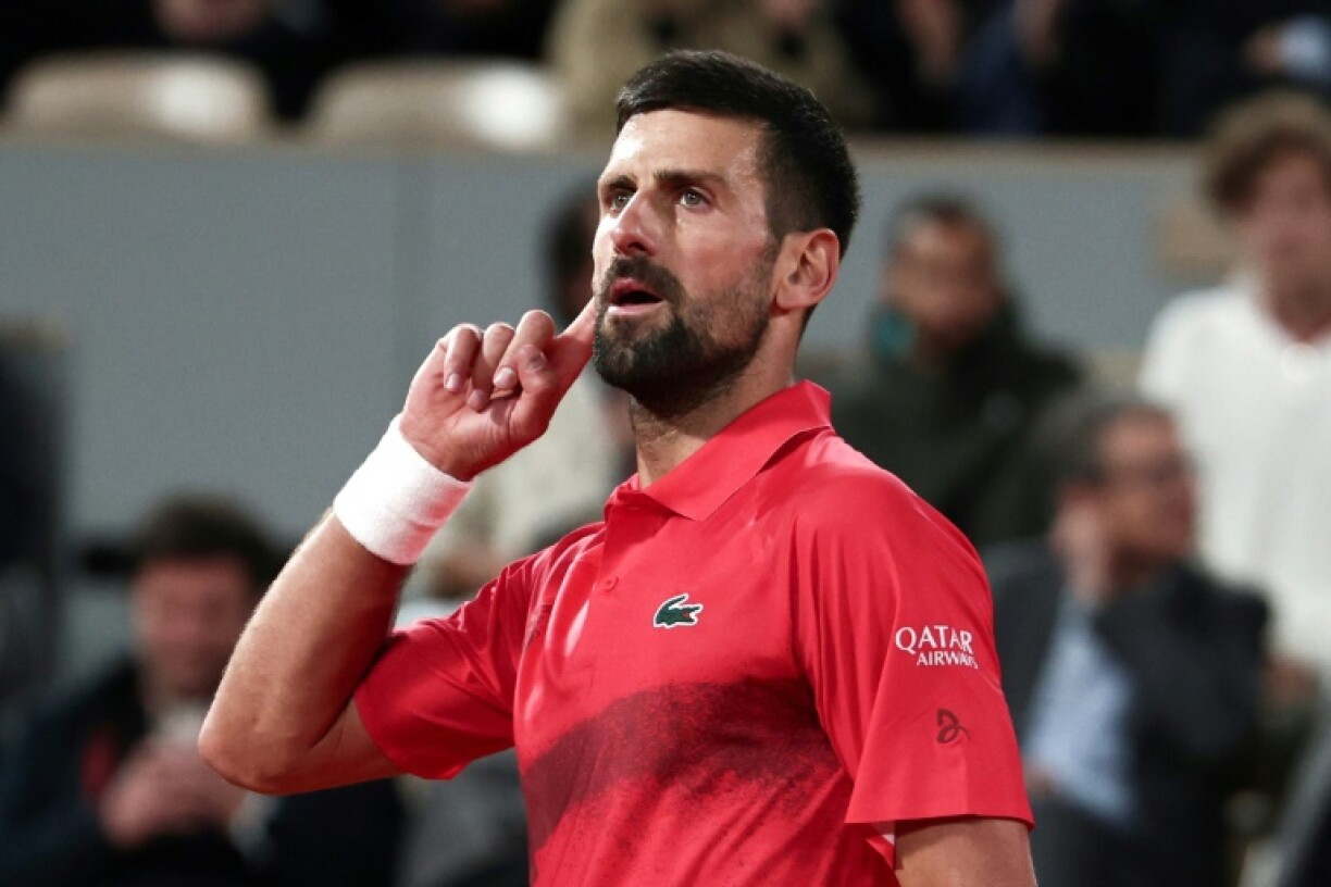 Novak Djokovic celebrates after winning a 41-shot rally against Alexander Zverev