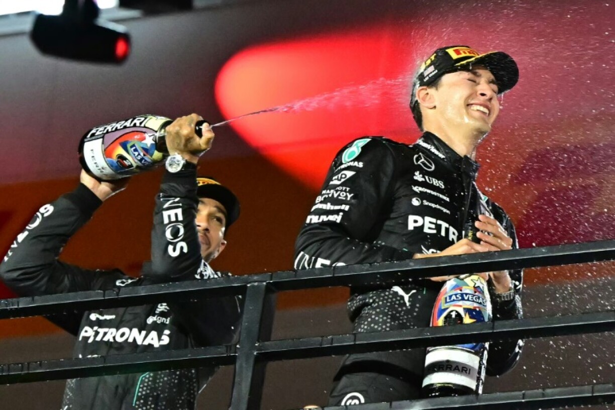 George Russell (R) with runner-up and then Mercedes team-mate Lewis Hamilton (L) after winning last season's Las Vegas Grand Prix