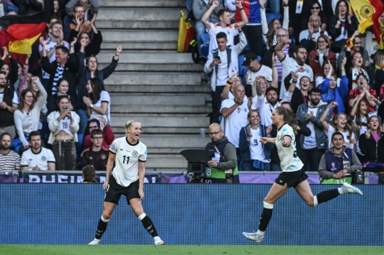 Lea Schueller (L) celebrates scoring Germany's winner against Denmark at Women's Euro 2025