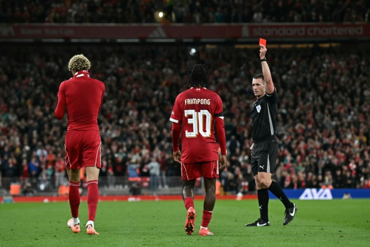 Liverpool forward Hugo Ekitike (L) will be suspended for the Premier League leaders' trip to Crystal Palace on Saturday