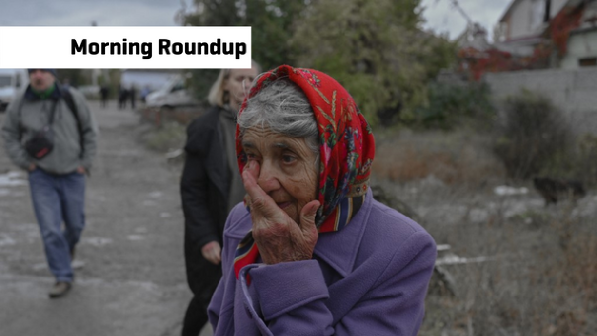 An woman cries in a street after a rocket attack in Mykolaiv on October 23, 2022 during the Russian invasion of Ukraine.