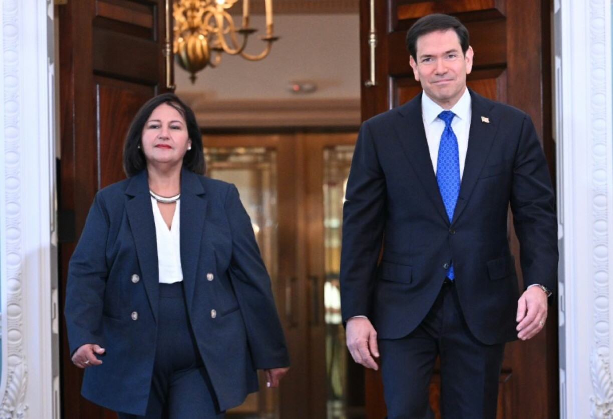US Secretary of State Marco Rubio (R) welcomed Venezuelan opposition figure Dinorah Figuera (L) to the State Department