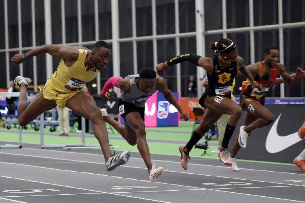 Grant Holloway (far left) blazes to victory in the men's 60m hurdles at the US Indoor Championships in New York