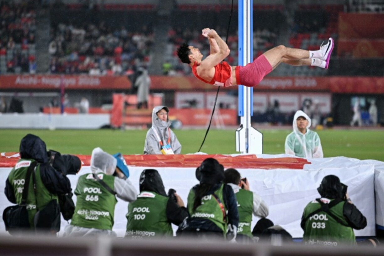 China's Yao Jie competes in the men's pole vault final