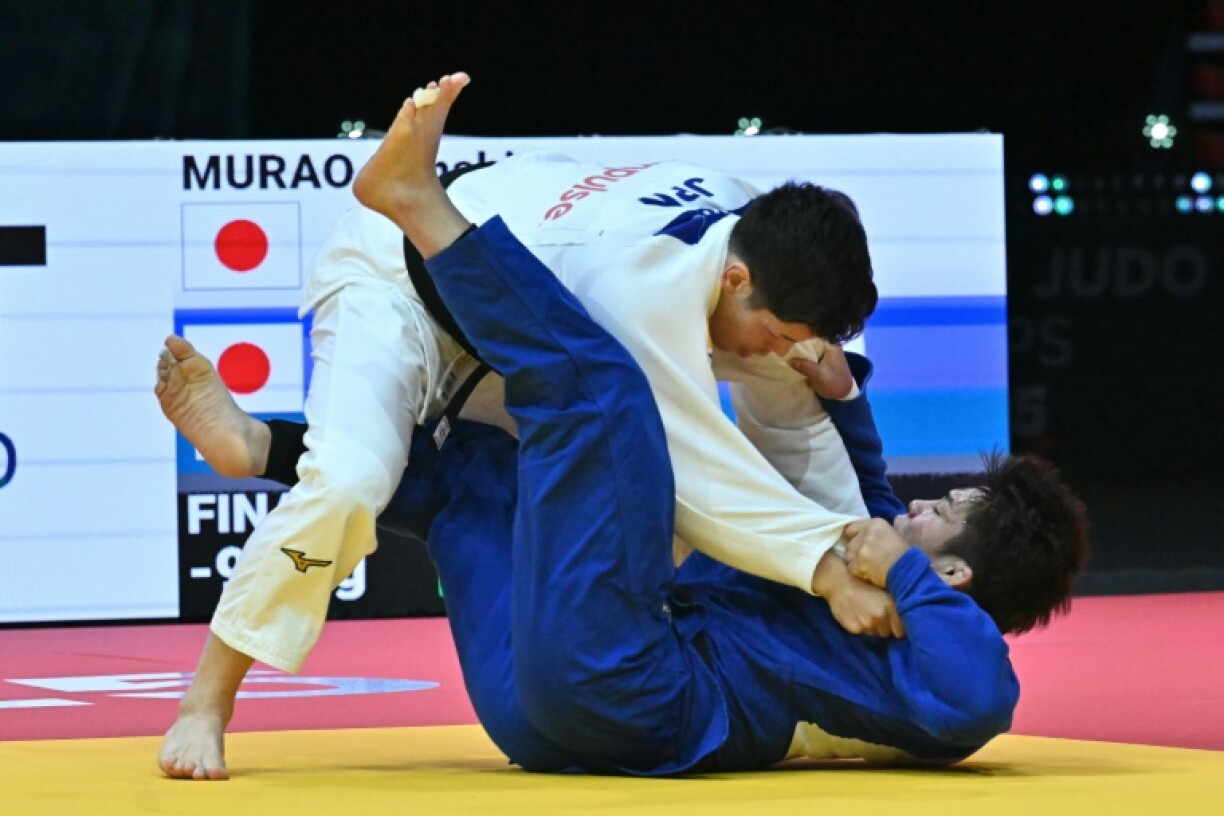 Japan's Sanshiro Murao beat defending champion and countryman Goki Tajima (blue) in the men's -90kg final at the world judo championships in Hungary