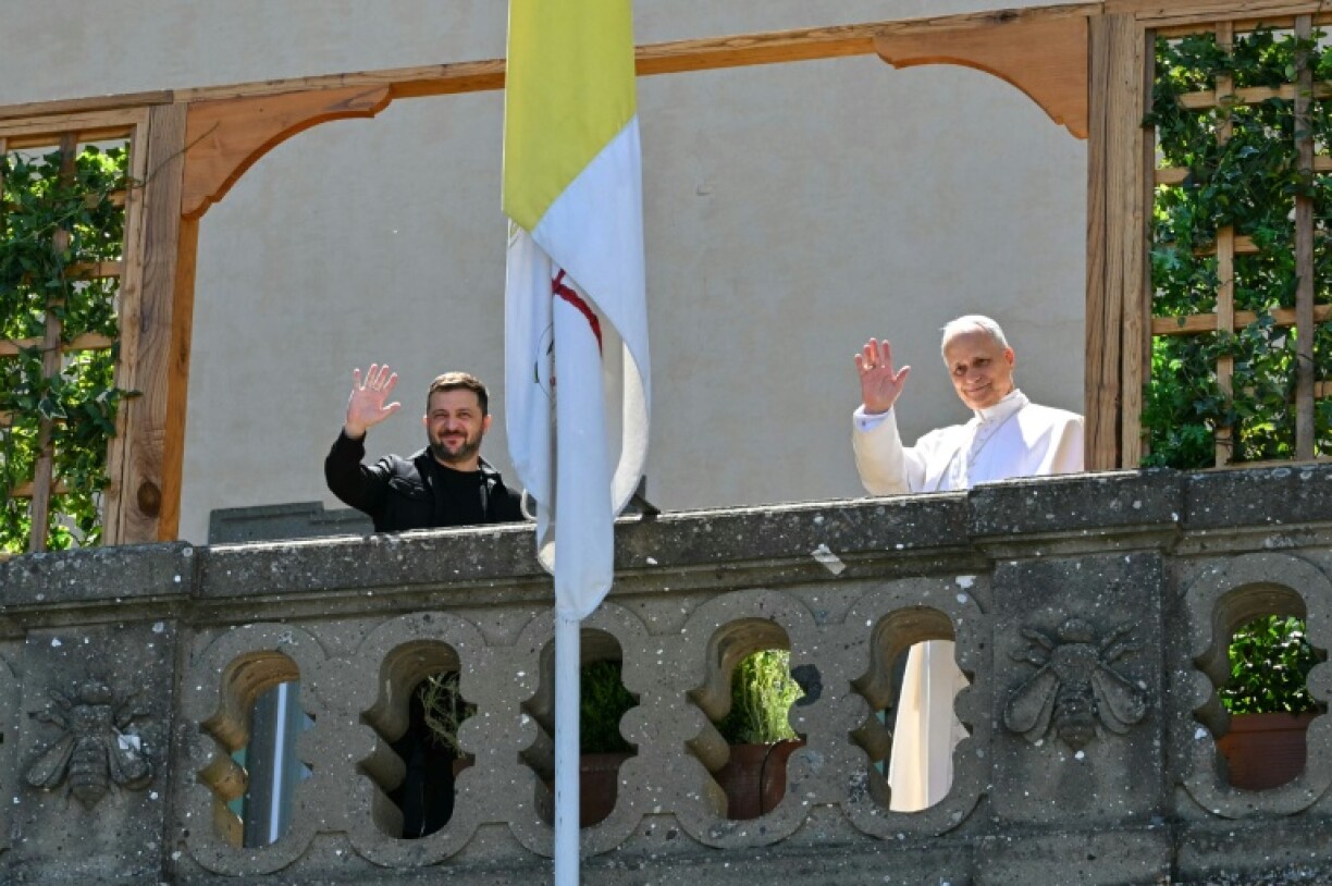 Ukraine's President Volodymyr Zelensky's (L) audience with Pope Leo XIV (R) was the second private meeting between the two men since