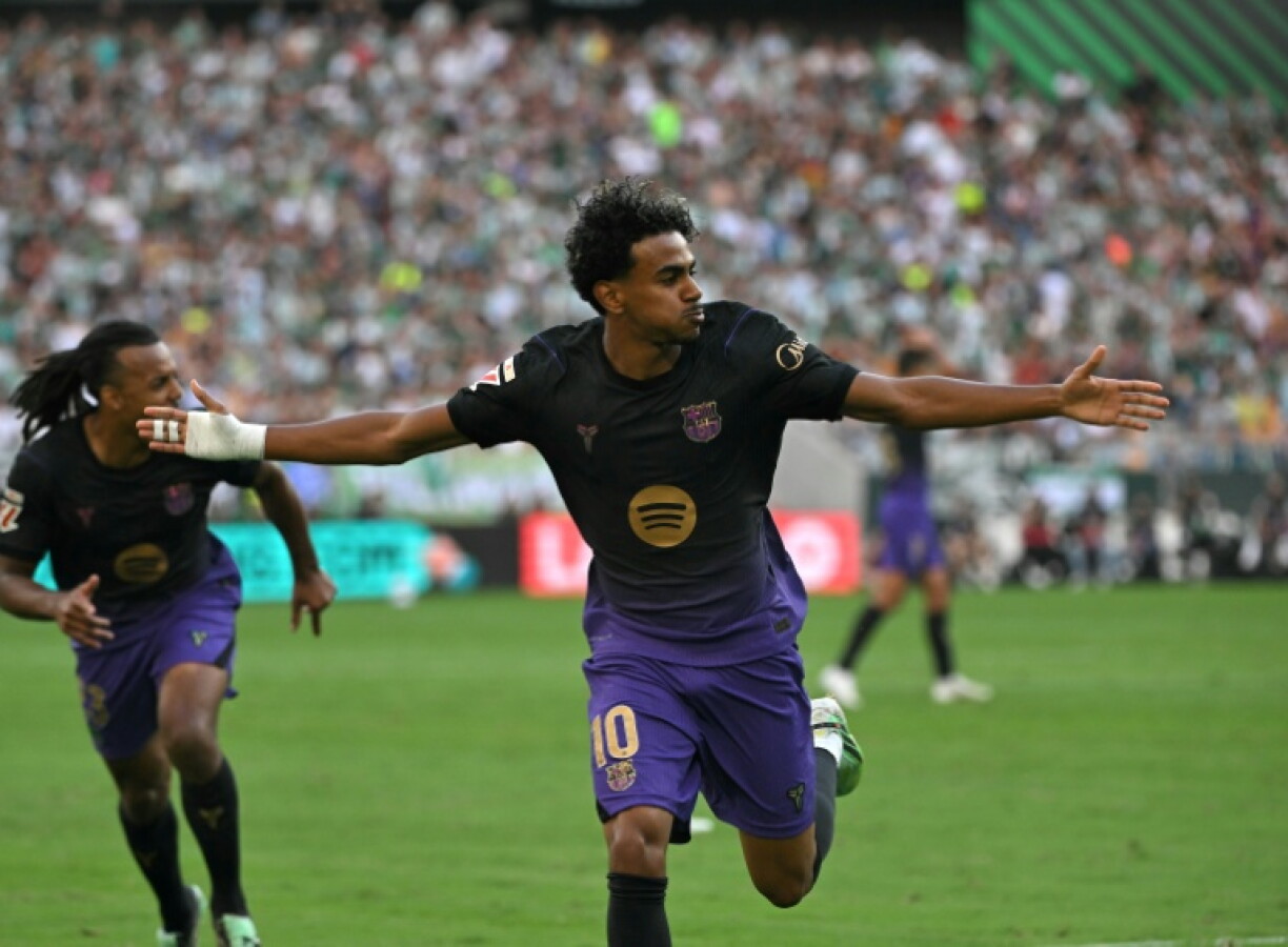 Lamine Yamal celebrated after scoring his sensational opening goal as Barca routed 10-man Real Betis on Saturday