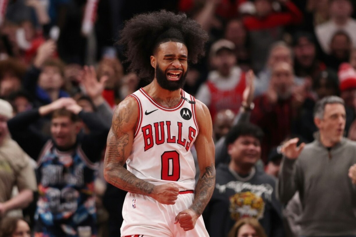 Chicago's Coby White celebrates a dunk in the Bulls' NBA victory over the San Antonio Spurs
