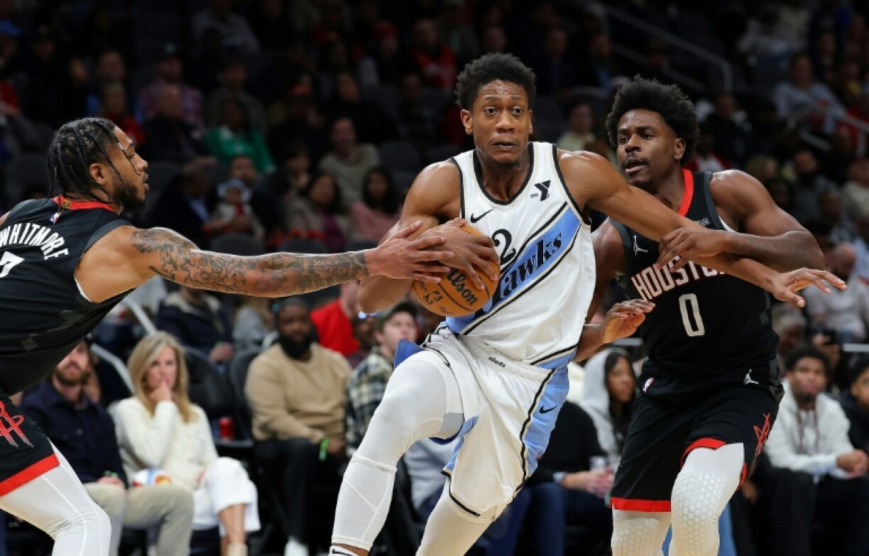 De'Andre Hunter (C) was reportedly sent from the Atlanta Hawks to the Cleveland Cavaliers in the final minutes before the NBA trade deadline