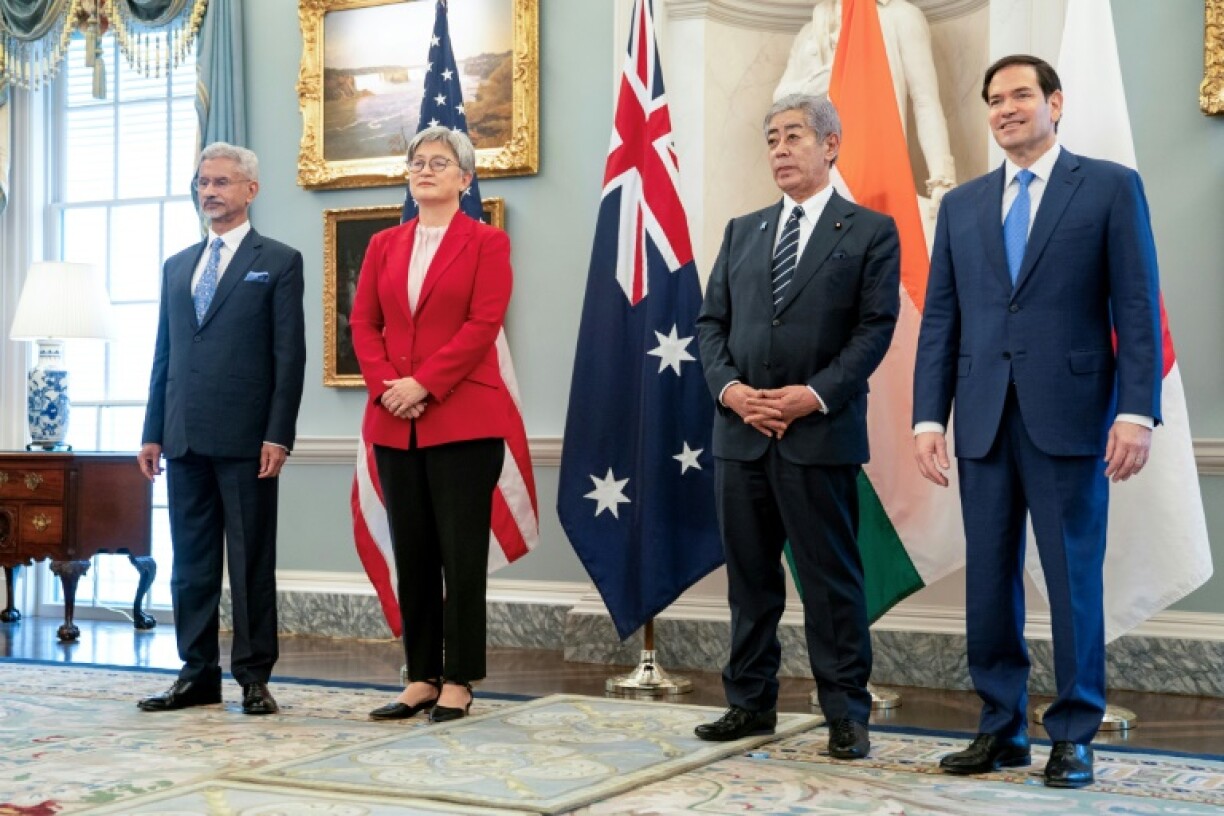 US Secretary of State Marco Rubio (R) poses for a group picture with (L to R) Indian Foreign Minister Subrahmanyam Jaishankar, Australian Foreign Minister Penny Wong and Japanese Foreign Minister Takeshi Iwaya
