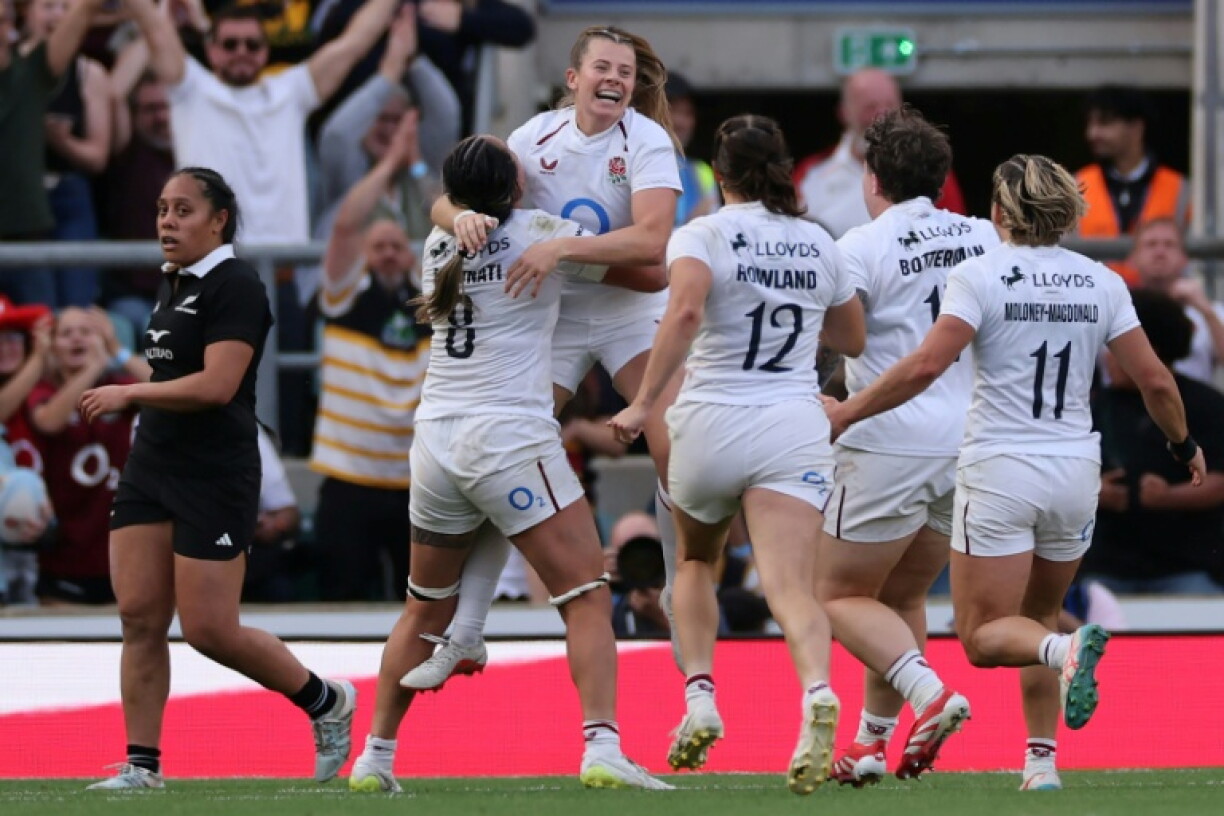 England fly-half Zoe Harrison celebrates after scoring a last-minute try to beat New Zealand in a WXV women's international at Twickenham