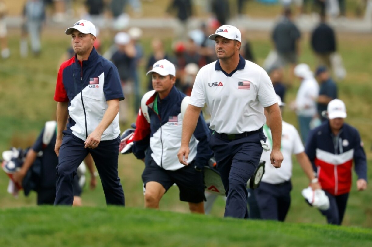 Bryson DeChambeau and Justin Thomas of the United States prepare to take on Europe's Jon Rahm and Tyrell Hatton in the first match of the Ryder Cup at Bethpage Black