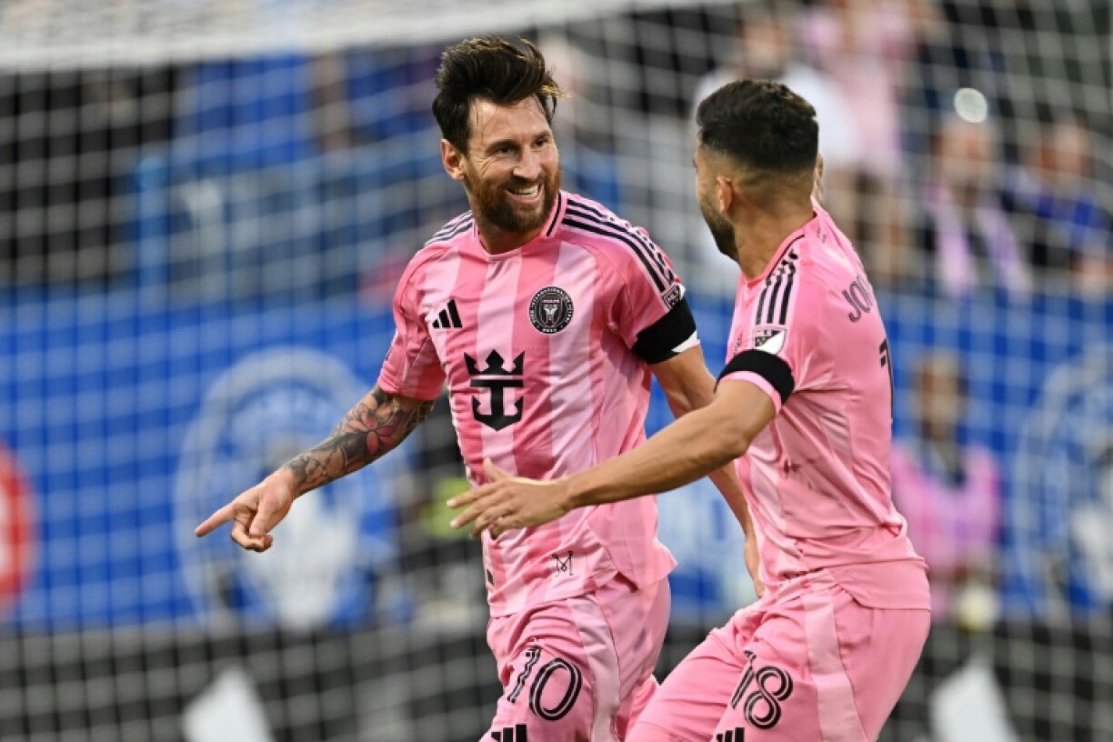 Lionel Messi of Inter Miami celebrates scoring his team's second goal with teammate Jordi Alba in Miami's 4-1 Major League Soccer victory over Montreal