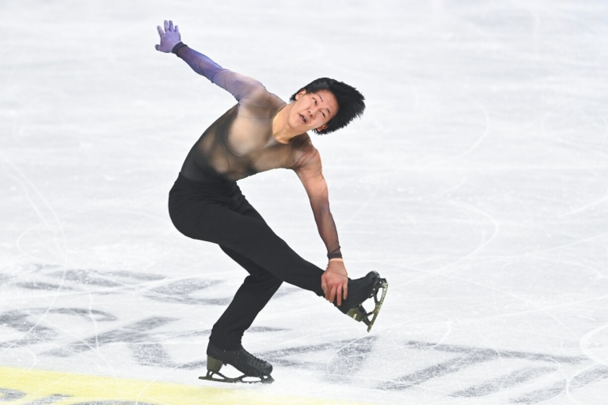 France's Adam Siao Him Fa performs during the world figure skating championships in Prague on March 26, 2026