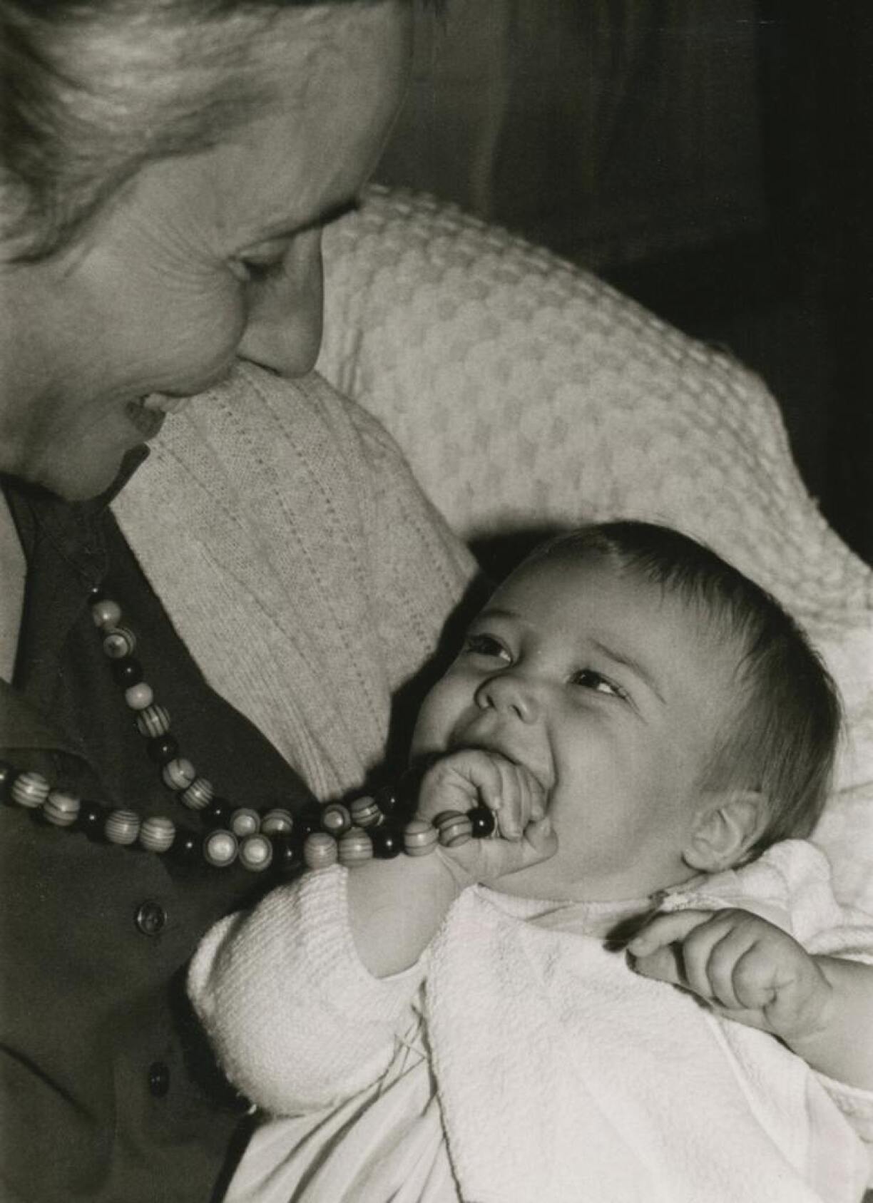 Countess Stéphanie as an young child in the arms of her mother, Countess Alix de Lannoy.