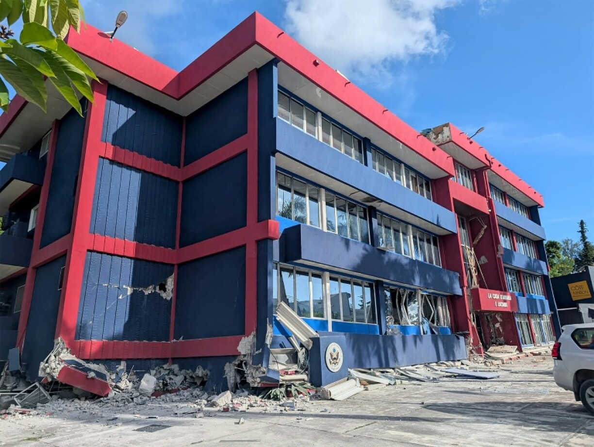 The quake completely destroyed the ground floor of this four-storey building housing several embassies