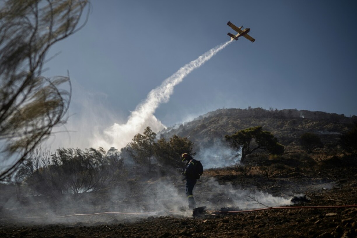 Firefighters have been battling a wildfire in Koropi, some 30 kilometres (20 miles) from Athens