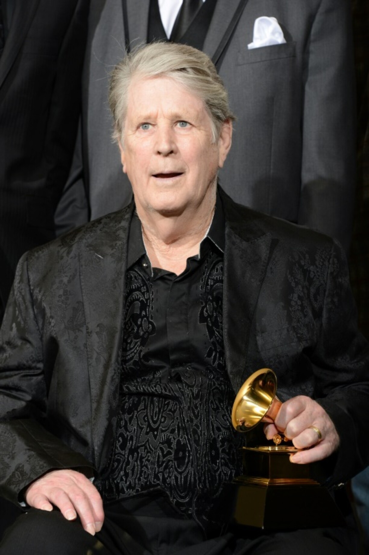 Brian Wilson of the Beach Boys holds a Grammy Award for best historical album for 'The Smile Sessions,' a version of the record that was abandoned in the 1960s by the band