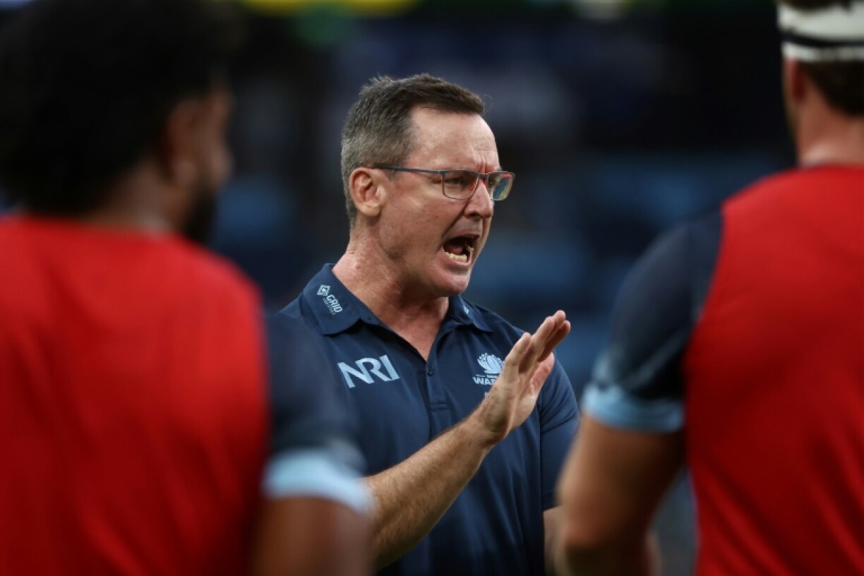 NSW Waratahs' Dan McKellar (C) has ruled himself of the running to take over from Wallabies coach Joe Schmidt
