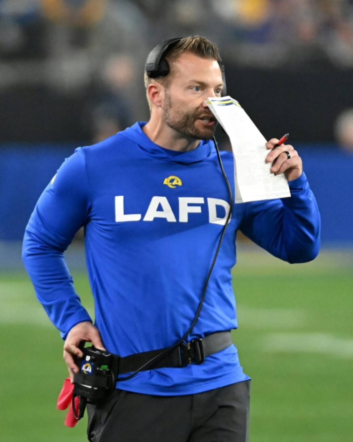 Los Angeles Rams coach Sean McVay wears a shirt honoring the Los Angeles Fire Department during the team's NFL playoff win over the Minnesota Vikings