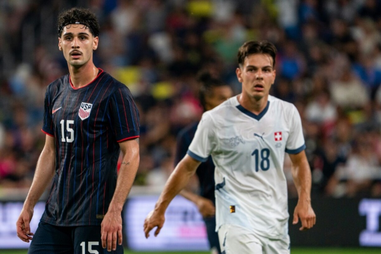 Johnny Cardoso (L) became the first player from the United States to sign for La Liga outfit Atletico Madrid