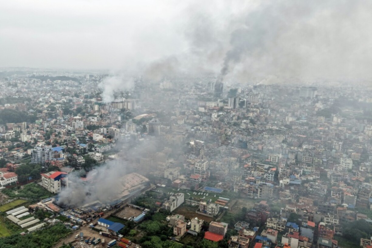 Plumes of smoke engulf Kathmandu, a day after several buildings were set ablaze by protesters