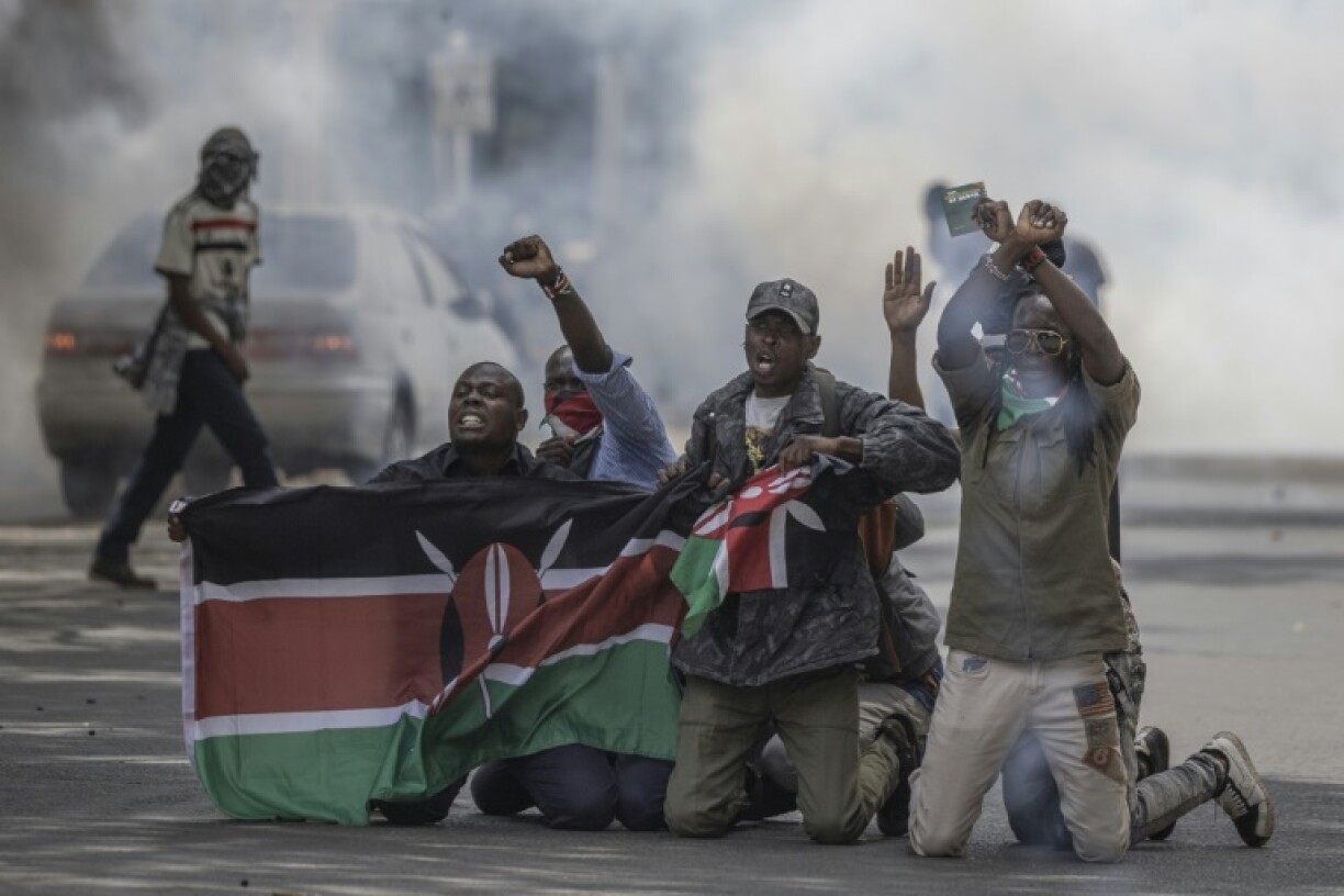 Protesters chanted anti-government slogans as they marched to parliament ahead of a budget presentation