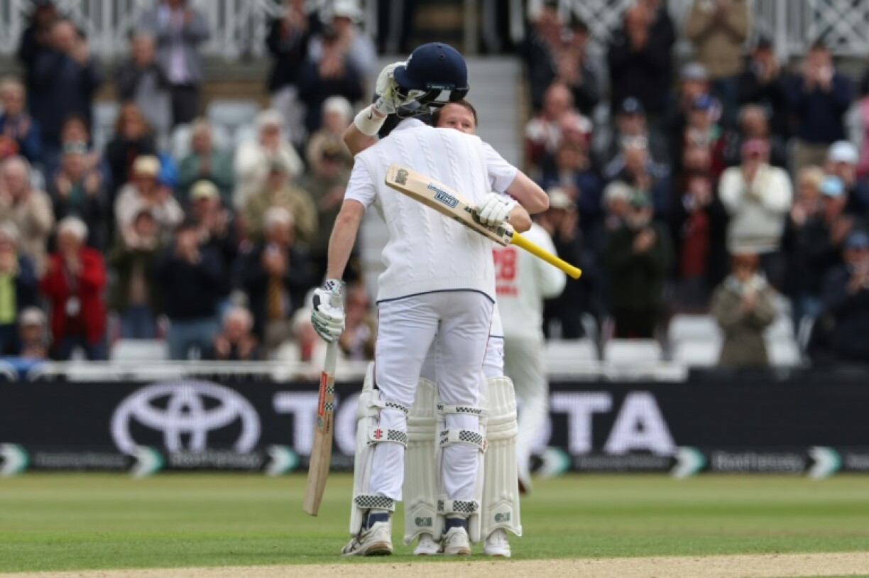 Ton of joy: England's Ben Duckett (R) is congratulated by Zak Crawley after reaching his century