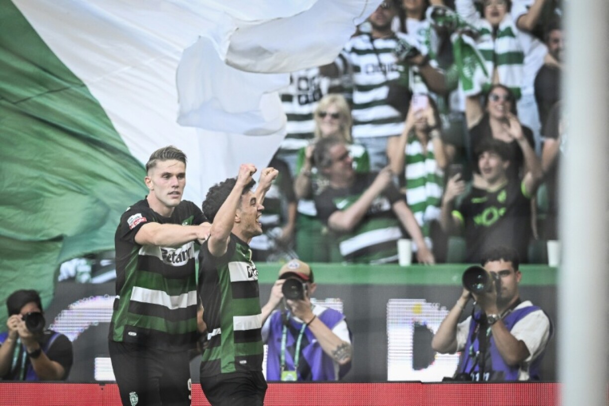 Sporting Lisbon forward Pedro Goncalves celebrates with Viktor Gyokeres after scoring the opening goal
