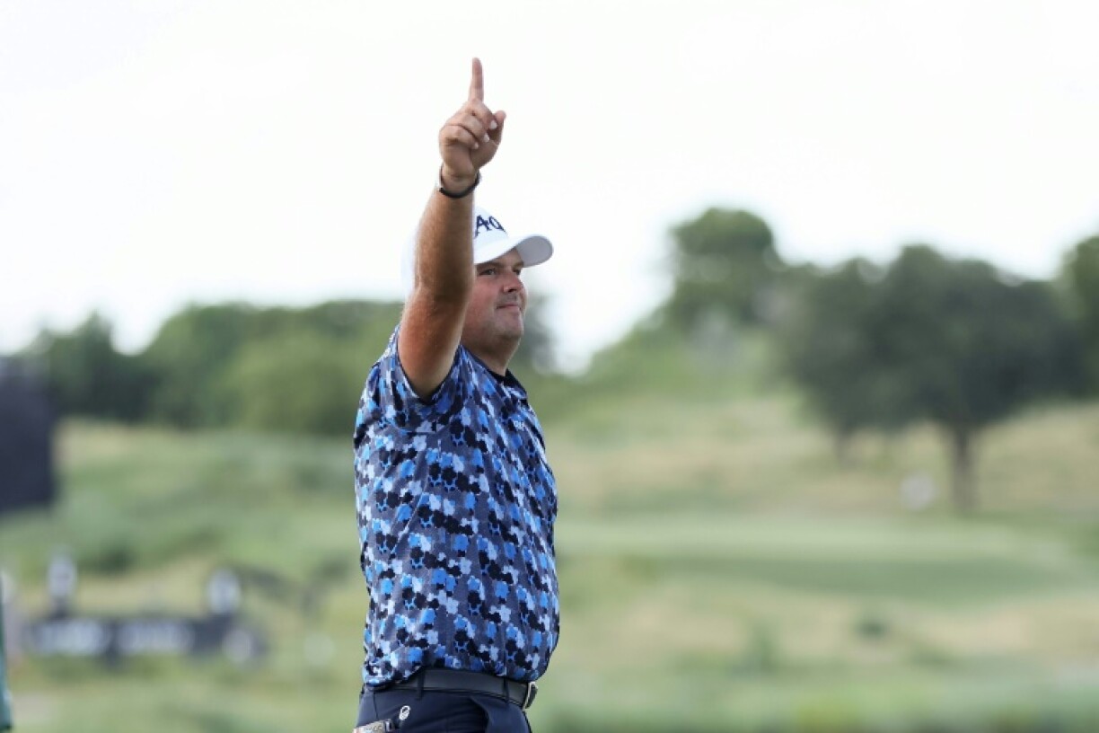 American Patrick Reed reacts after sinking the winning putt on the first playoff hole to capture LIV Golf Dallas for his first victory in 41 starts on the Saudi-backed series