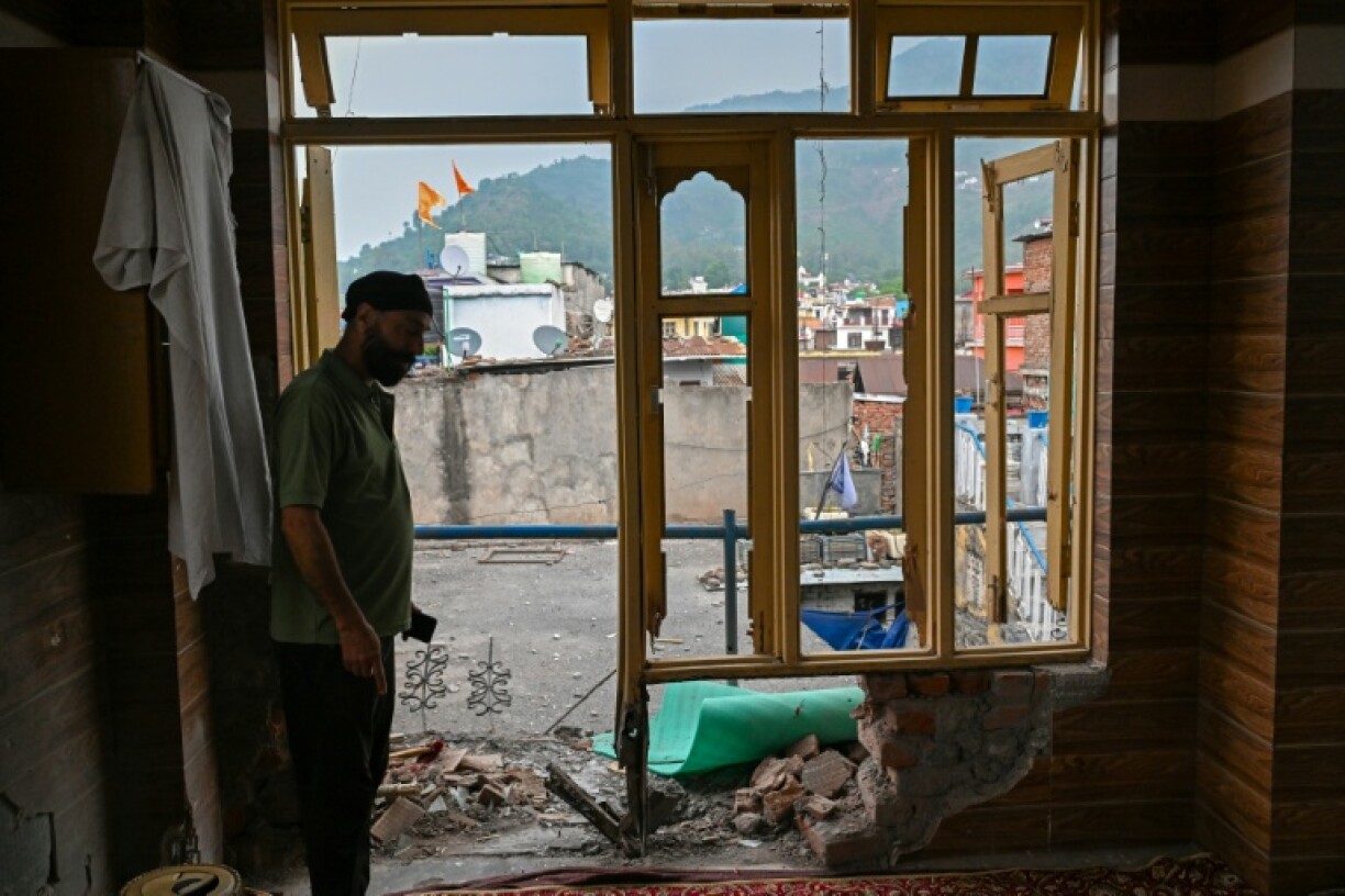 Much of Poonch -- where buildings hit by artillery fire could be seen -- is now deserted, but a few people have stayed