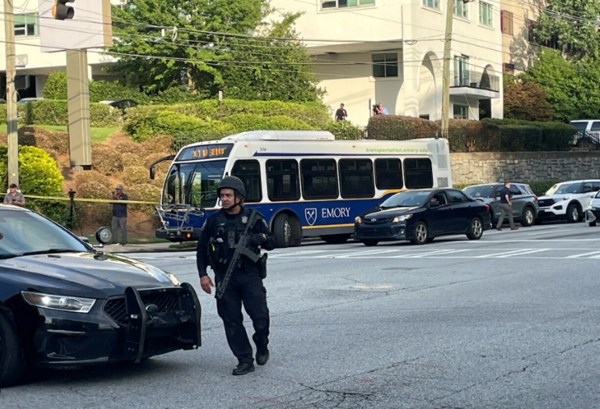 A gunman killed a police officer Friday near the headquarters of the Centers for Disease Control in the US city of Atlanta before being found dead at the scene, authorities said