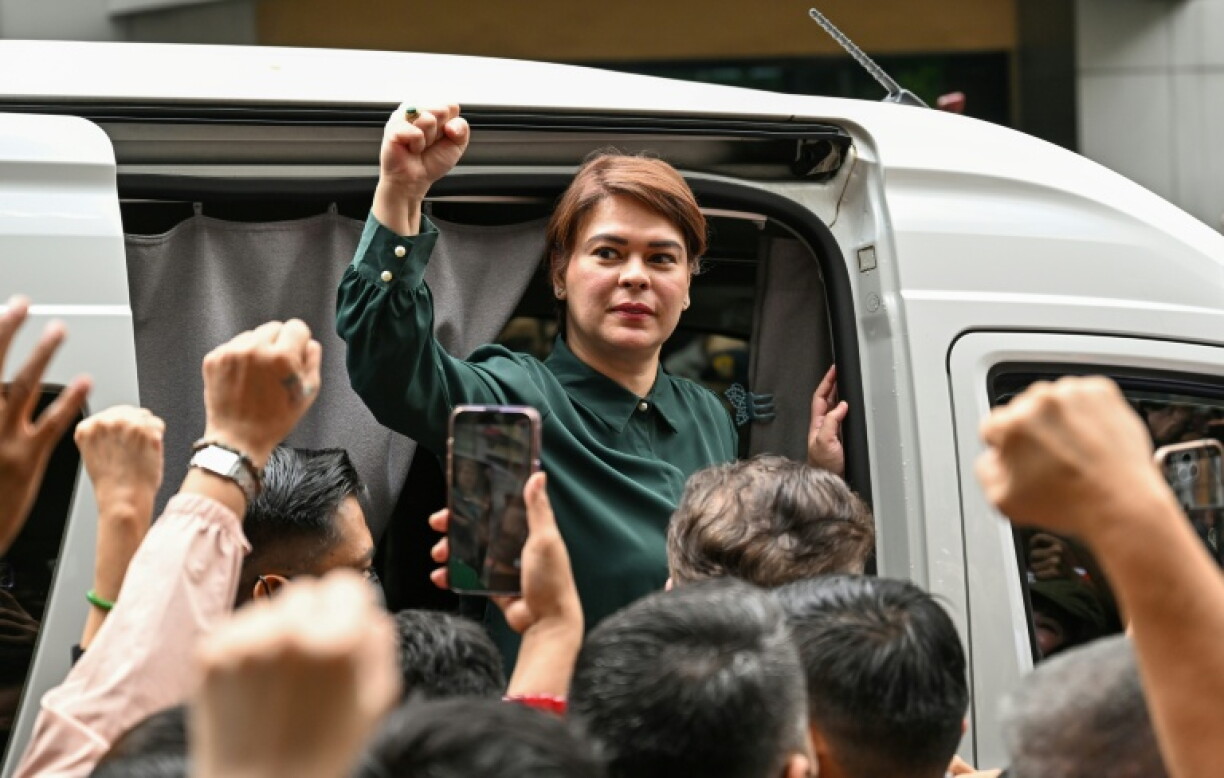 Philippine Vice President Sara Duterte gestures as she leaves the Hall of Justice in Quezon City, Metro Manila on September 11, 2026.
