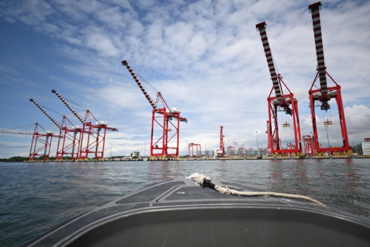 General view of Puerto Bolívar, in the Jambeli Archipelago in the province of El Oro The once-thriving port of Puerto Bolivar is nearly dormant, with no ships in sight, as local fishermen, particularly vulnerable to the drug violence that plagues the region, are afraid to speak out.