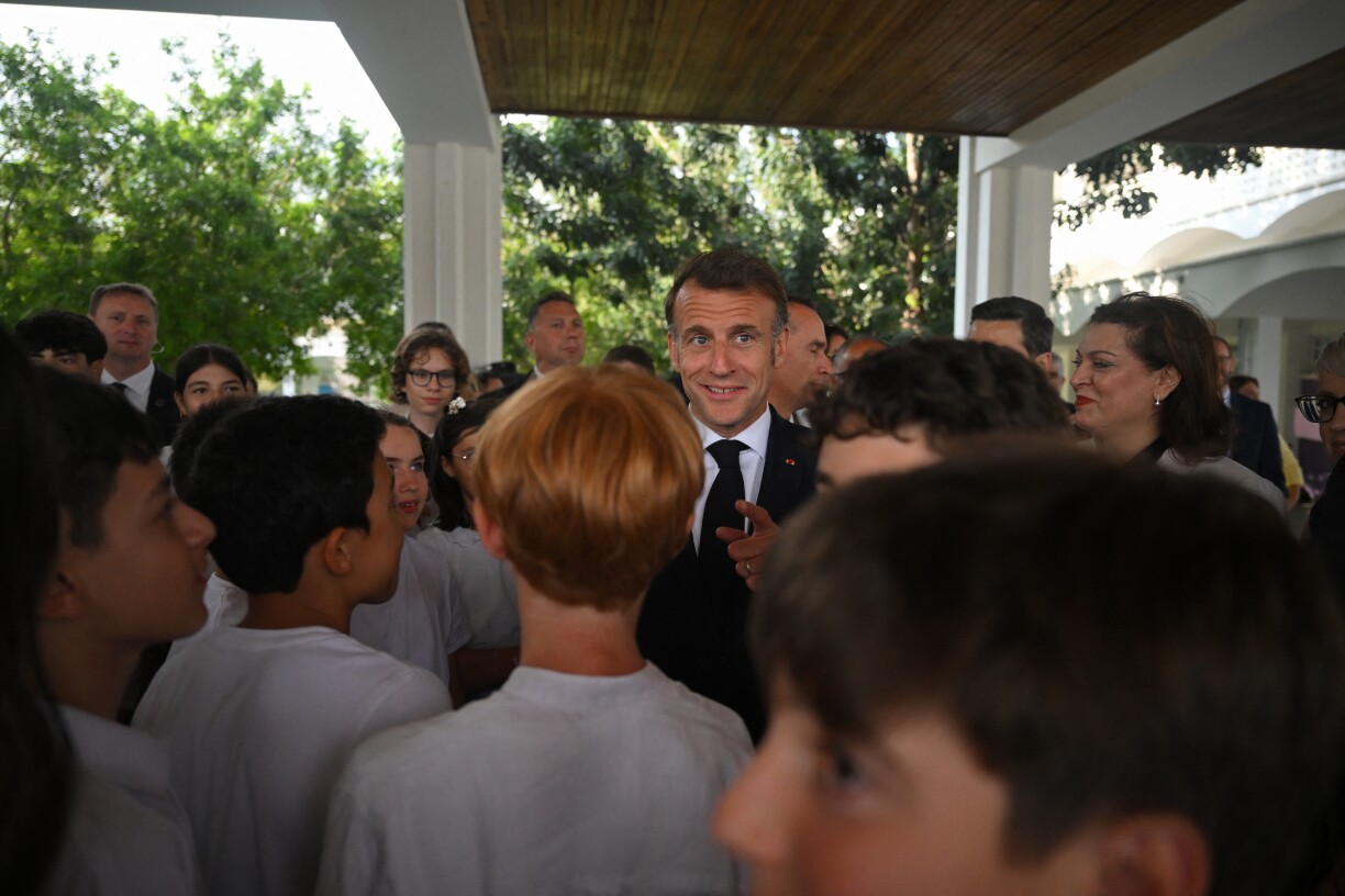 D'Schüler hate vill Froen un de franséische President