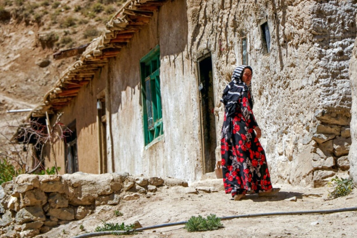 Women and girls traditionally make the long trips to collect water, made more difficult since the Taliban government came to power