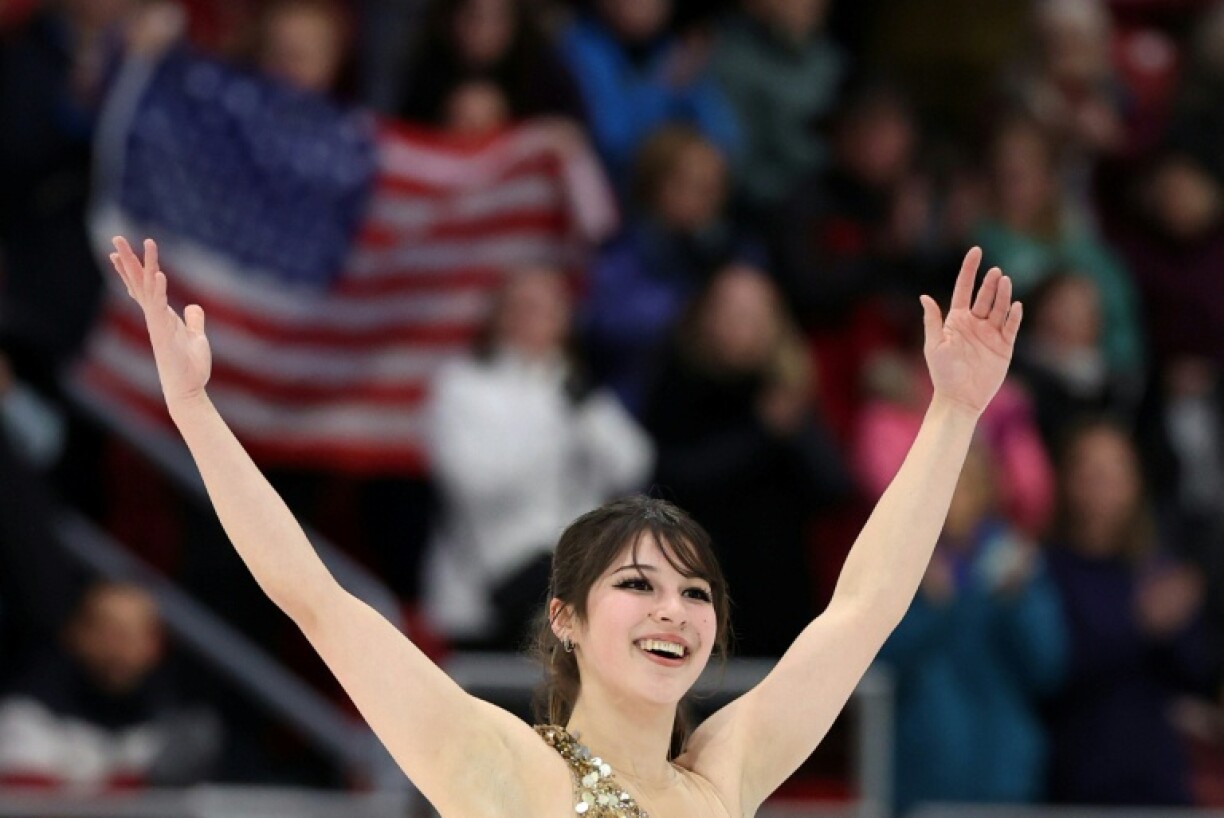 Alysa Liu of the United States reacts after delivering the winning free skate performance to capture the overall women's crown at Skate America