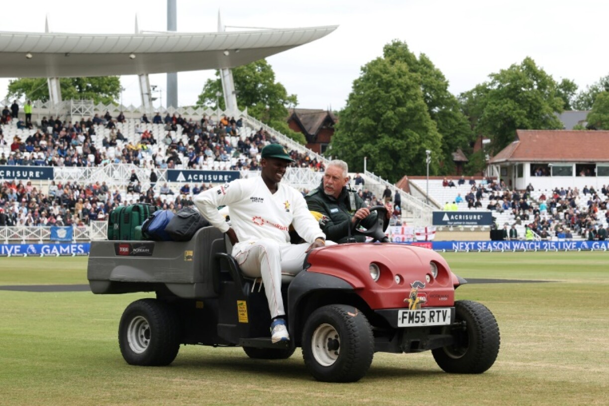 Zimbabwe setback: Richard Ngarava leaves the field on a medical cart after suffering a back injury while fielding against England at Trent Bridge