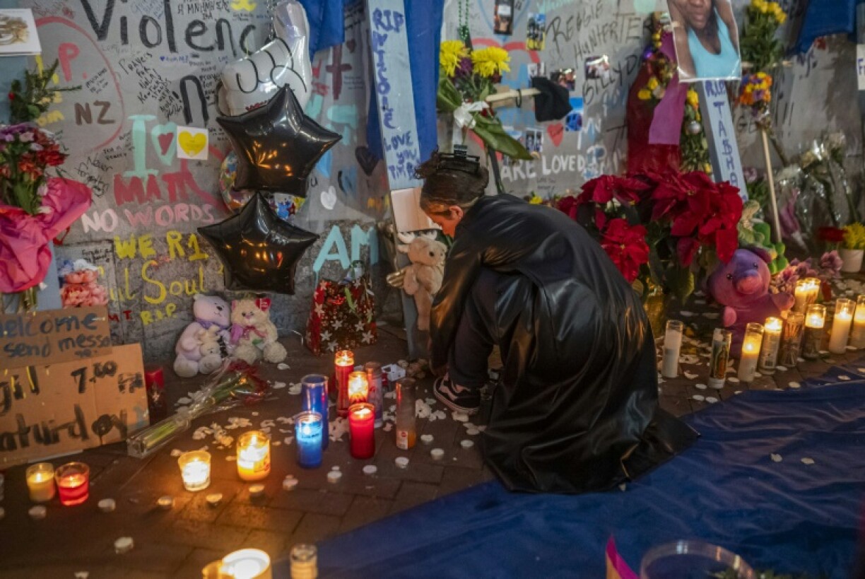 Mourners hold a vigil on Bourbon Street for the 14 victims killed in a January 1, 2025 truck-ramming attack in New Orleans, Louisiana
