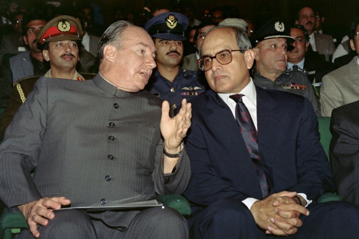 The Aga Khan (L), pictured in 1994 with then-Pakistani President Farooq Ahmed Leghari, launched an apolitical secular development foundation that was credited with raising literacy levels in 18 countries
