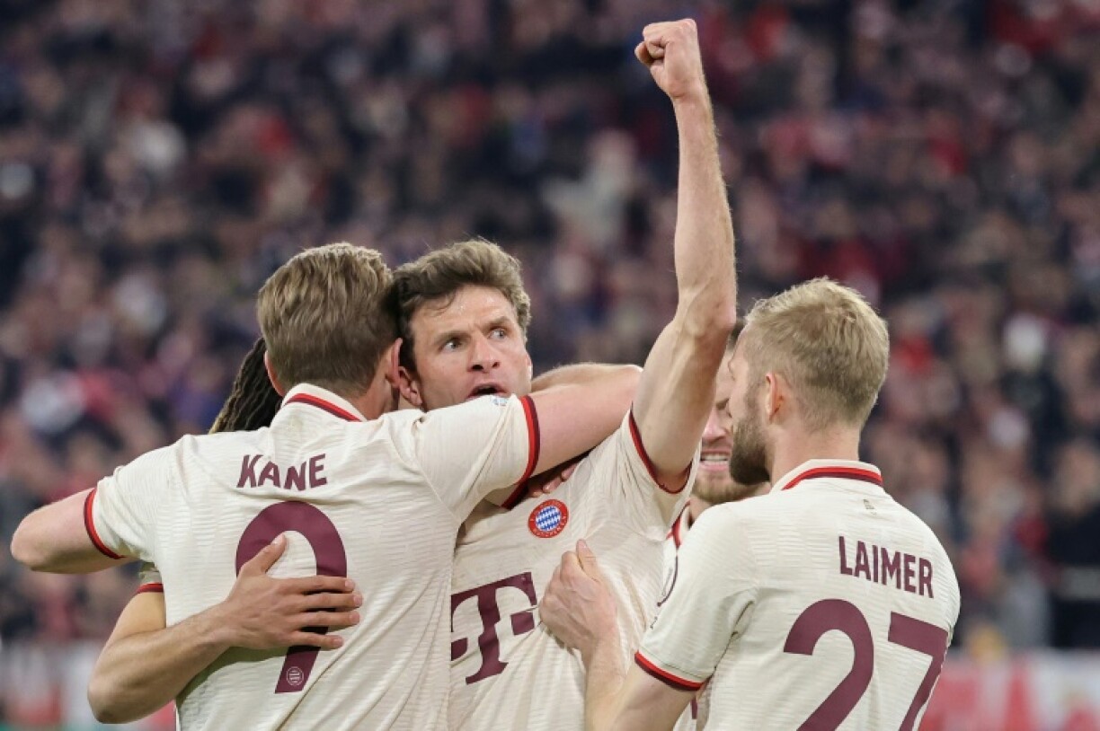 Bayern Munich forward Thomas Mueller (centre) will leave the club in the summer