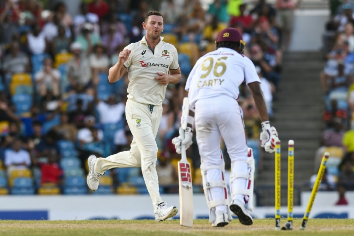 Josh Hazlewood (L) of Australia took five wickets in his side's win against the West Indies