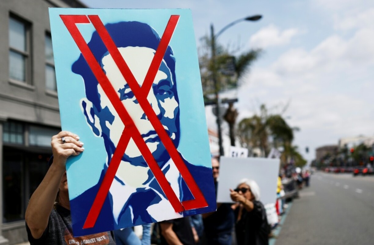 Protesters demonstrate against Tesla CEO Elon Musk's Department of Government Efficiency (DOGE) initiatives in March 2025 in Pasadena, California