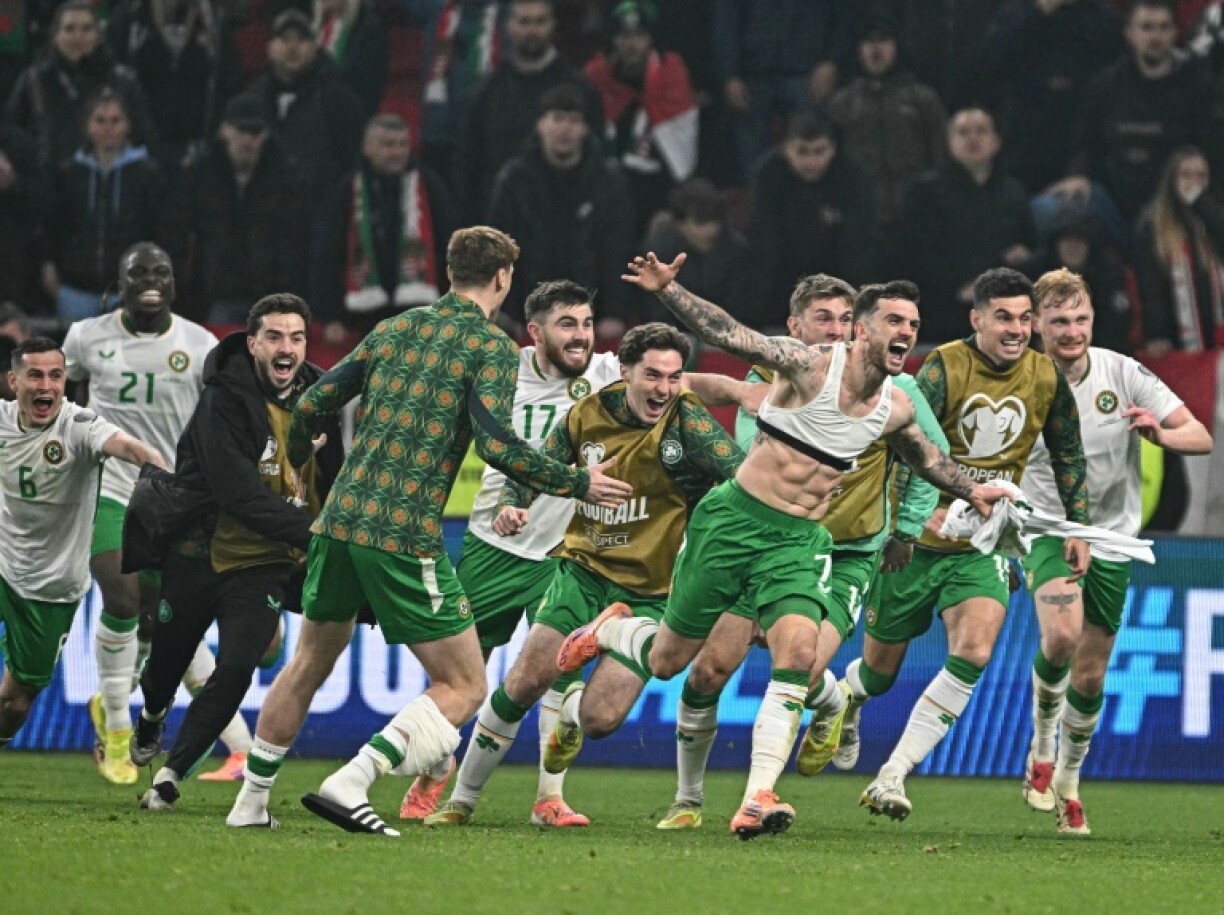 Troy Parrott, in the vest, celebrates his winning goal for the Republic of Ireland against Hungary that secured a place in the World Cup playoffs