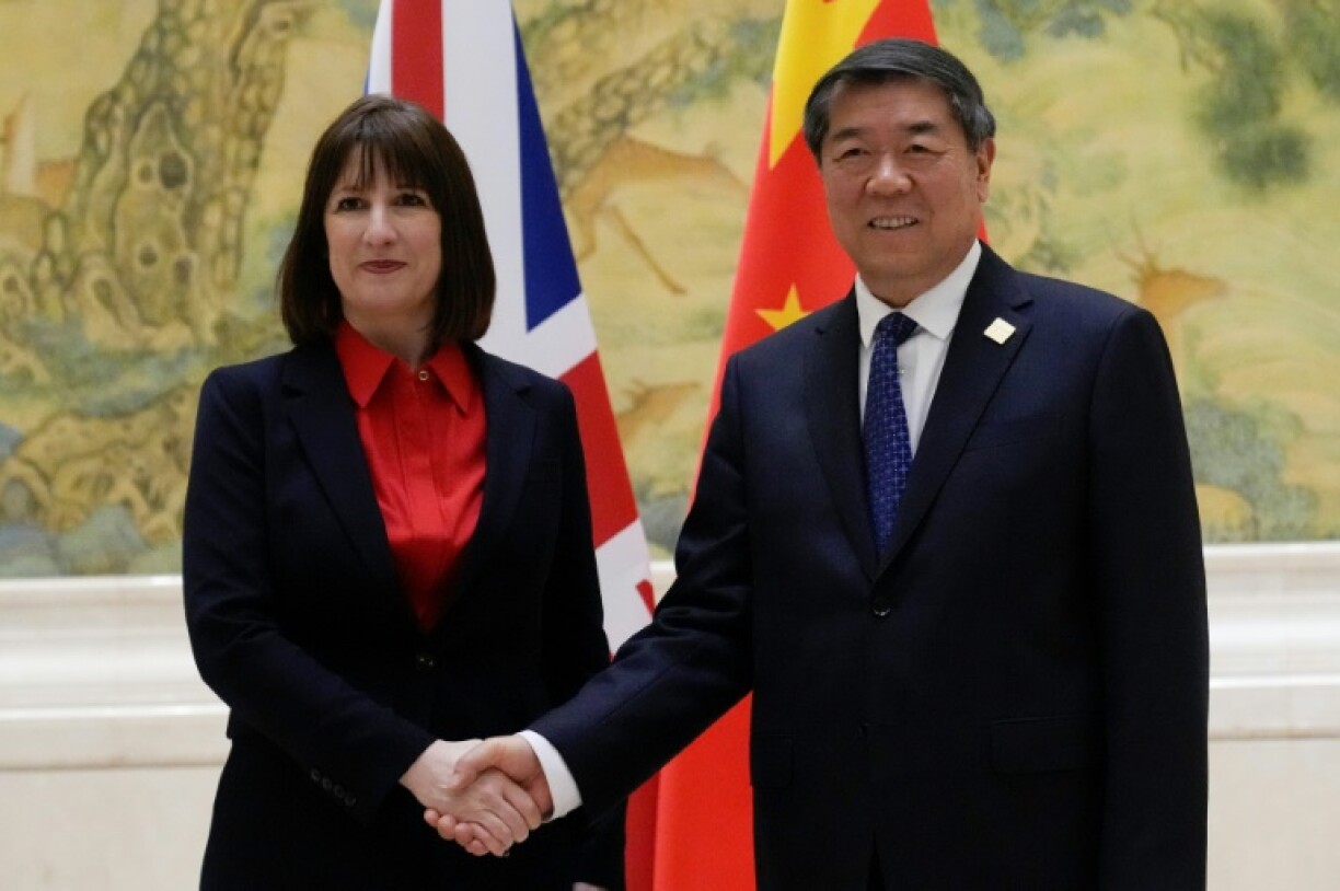 Finance minister Rachel Reeves (L, with Chinese Vice Premier He Lifeng) is the most senior British government official to visit China in seven years