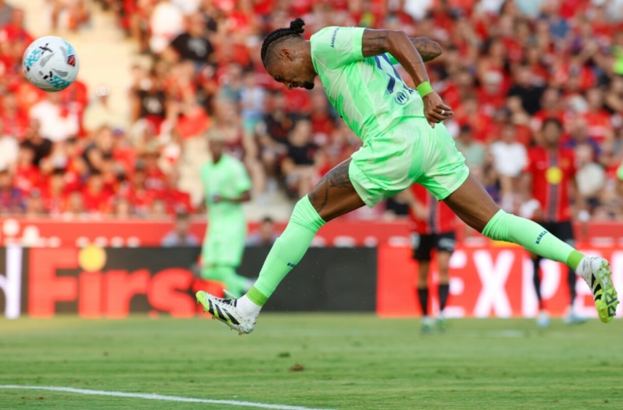 Raphinha heads home Barcelona's first goal of the season.