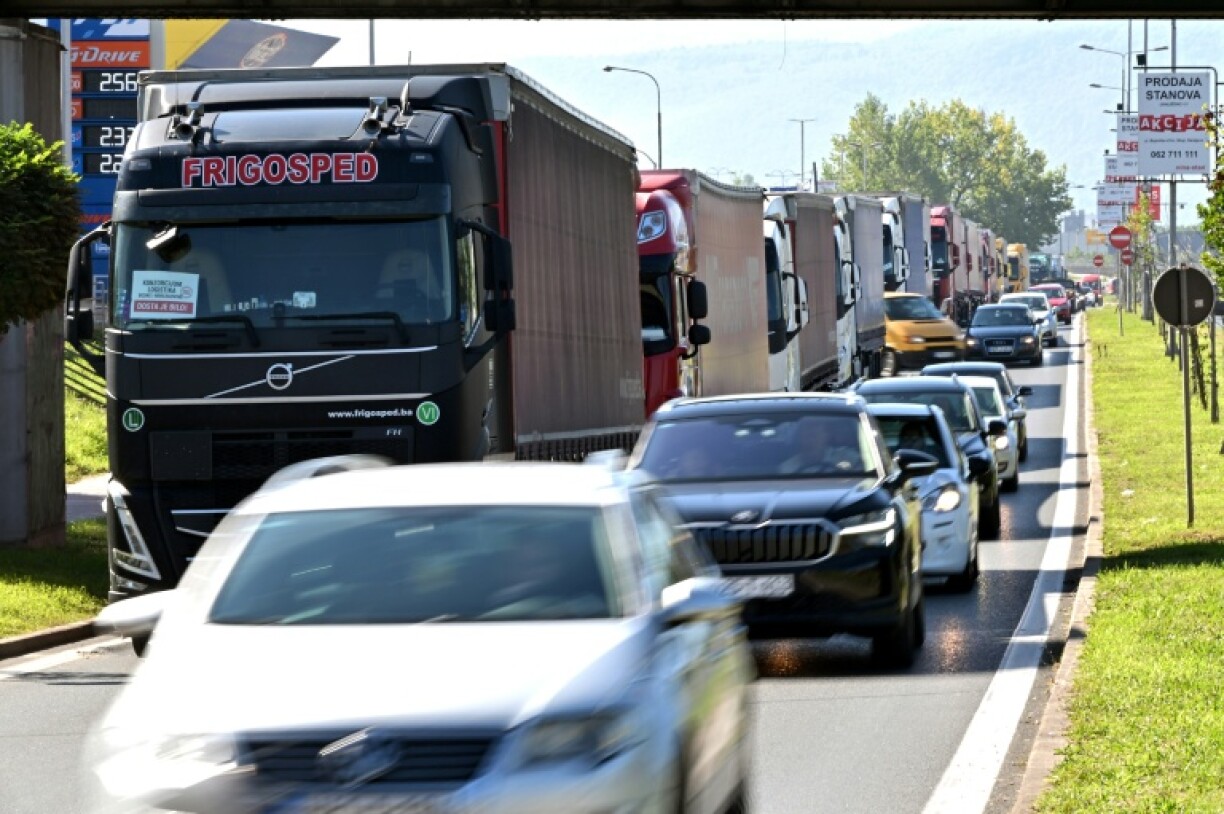 Trucks partially blocked a highway leading to Sarajevo in protest over EU rules