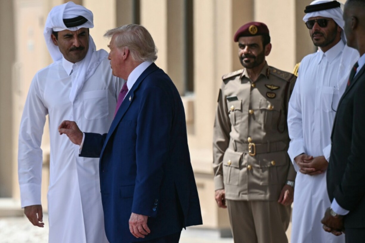 Qatar's Emir Sheikh Tamim bin Hamad al-Thani and US President Donald Trump at the Al Udeid air base, the largest US military facility in the region