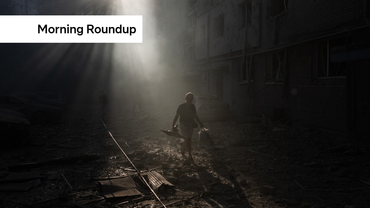 A person walks next a residential building damaged following a Russian air attack on the Ukrainian capital of Kyiv on 2 July 2026, amid the Russian invasion in Ukraine.